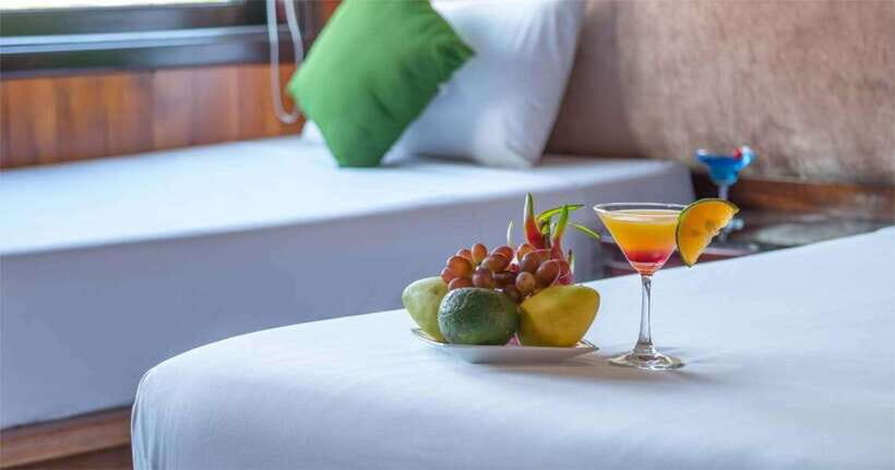 2-Day 1-Night Cruise:Visit Bai Tu Long Bay_ Less Touristic - Cong Do at night: sundeck time, onboard meals, and cabin comfort