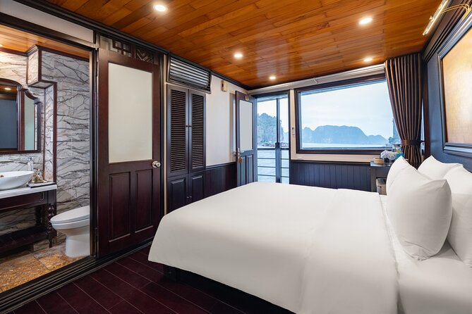 2-Day Boutique Cruise Discover Hidden Gems of Bai Tu Long Bay - Day 1: cruise time, Cap La beach, and a sunset mood
