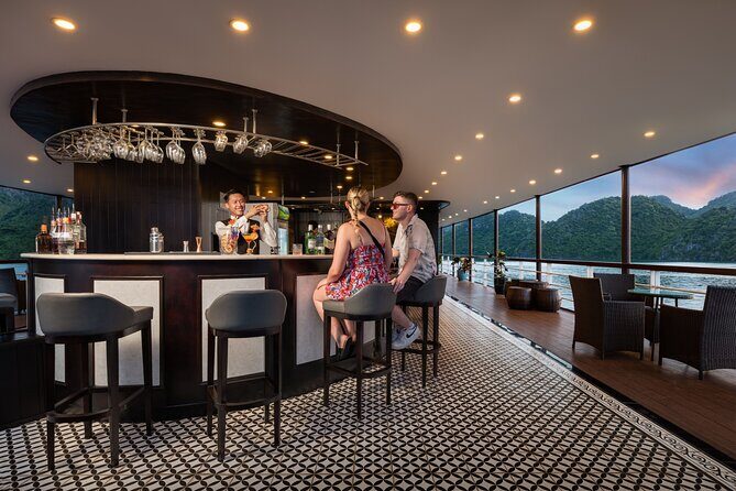 2 Day Guided Cruise Tour in Halong Bay and Lan Ha Bay from Hanoi - Cooking Class and Sunset Party: The Onboard Moments Worth Dressing For