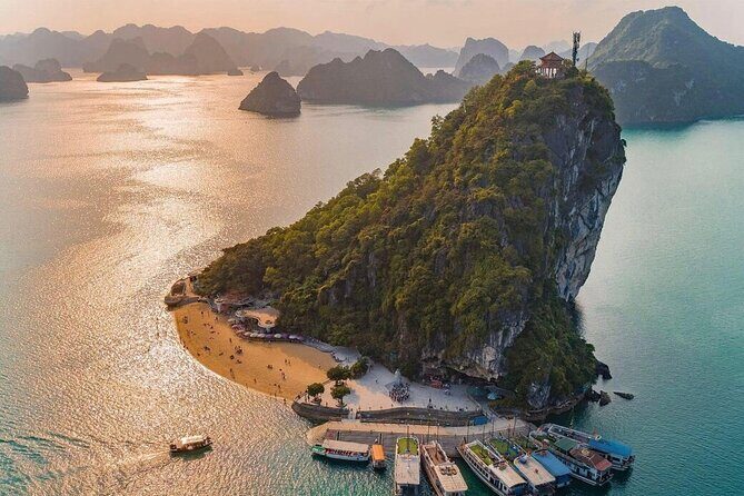 2-Day In Halong Bay Cruise With Transfer From Hanoi - Day 2 on the schedule: tai chi, bamboo boats, and Dark & Light Cave