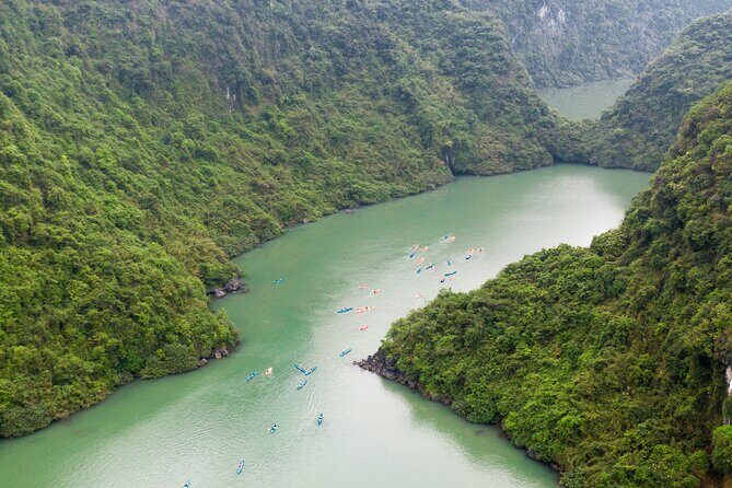 2 Days Cruise Tour in Halong Bay from Hanoi - Evening on Oasis Bay: sundeck wind-down, outdoor jacuzzi, and sunset party energy