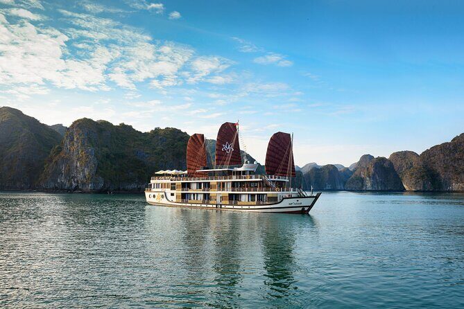 3-Day Halong Orchid Cruises - Day 3 sunrise mode: tai chi on the sundeck and early-bay calm