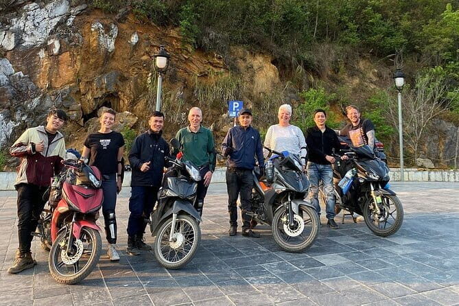 3 Days Ha Giang Loop Group Tour - Day 2: Waterfall reset, M-shaped Road thrill, Meo Vạc market, and Ma Pi Leng Pass