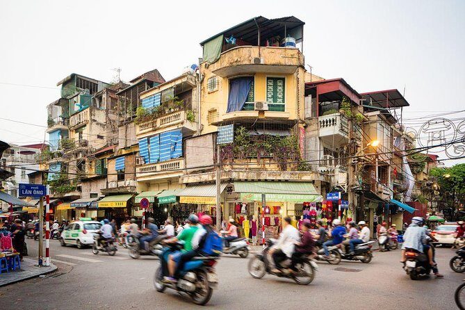 5-Day Northern Vietnam Tour: Hanoi - Ninh Binh - Halong Bay - Halong Bay Day 2: Cave Time, Ti Top Views, and Sunset on the Cruise
