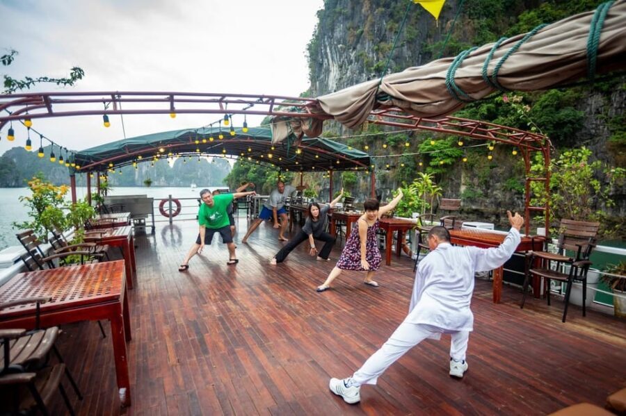 Bai Tu Long Bay 2 Days 1 Night With Renea Cruise - Day 2 in Bai Tu Long Bay: Tai Chi morning, Thien Canh Son Cave, and Hon Co beach