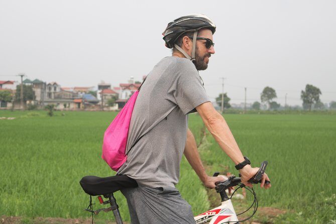 Bicycle Tour Full Day Explore Red River Delta & Rural Villages - Co Loa countryside roads: rice paddies, vegetables, and real village edges