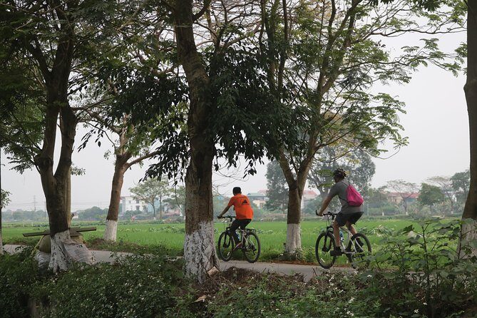Bicycle Tour Full Day Explore Red River Delta & Rural Villages - Long Bien Bridge and the first taste of Hanoi riding