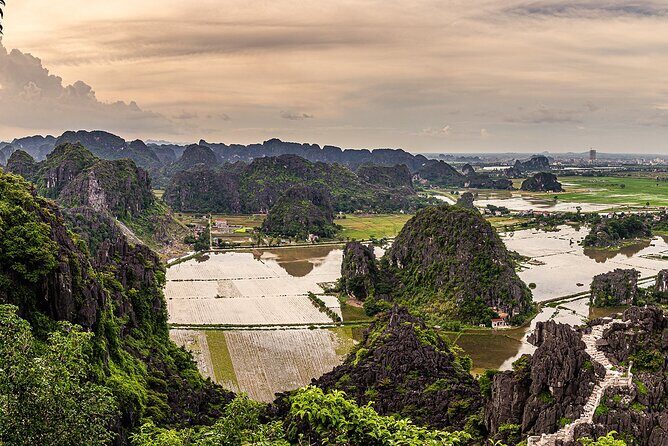 Boat and Bike Riding with Mua Cave in Ninh Binh Full Day Tour - A full-day route: from Hoa Lu temples to Mua Cave views