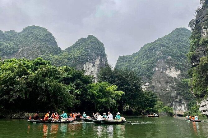 Boat and Bike Riding with Mua Cave in Ninh Binh Full Day Tour - Tam Coc by bamboo boat at 13:00: cave views and calm river time