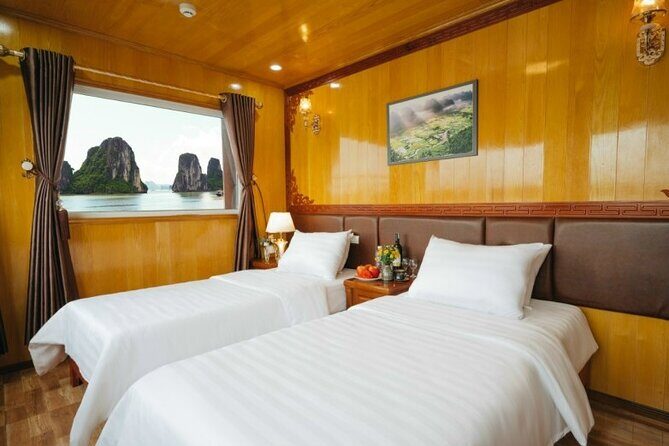 BOUTIQUE CRUISE 2 Days 1 Night Explore Lan Ha Bay & Cat Ba Island - Day 1: lunch cruise, Dark & Bright Cave kayaking, and the jump-in water time