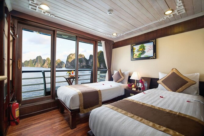 BOUTIQUE CRUISES Halong Bay 2 Days,1 Night Tour: Swimming,Caving, and Kayaking - Day 1 on Ha Long Bay: caves, kayaking, swimming, and mountain time