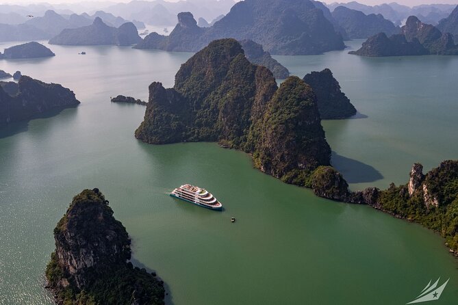 Capella Cruise Halong Bay 2Day/1 Night 6 Star Cruise All Included - Halong Bay afternoon: caves, islands, beaches, and kayaking through limestone