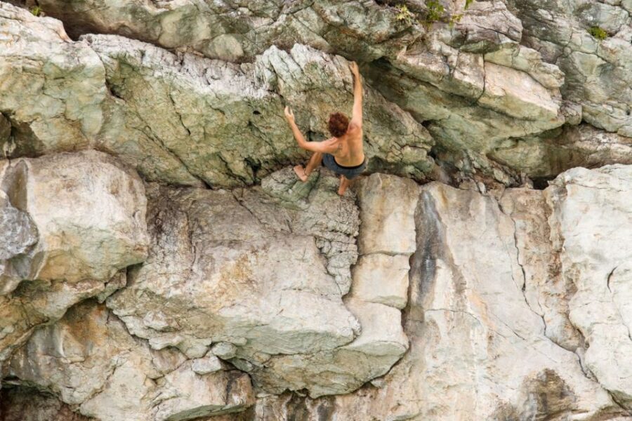 Cat Ba: Advanced Rock Climbing & Cliff Jumping Boat Tour - Boat day layout: basket boats, a bigger junk boat, and two wall sessions