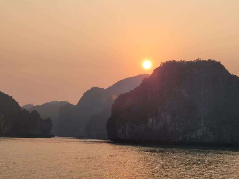 Cat Ba: Day boat tour with: kayak, cave, bike, meal, tickets - Viet Hai Village Bike Tour: Rice Fields, Fishermen, and Fish Massage
