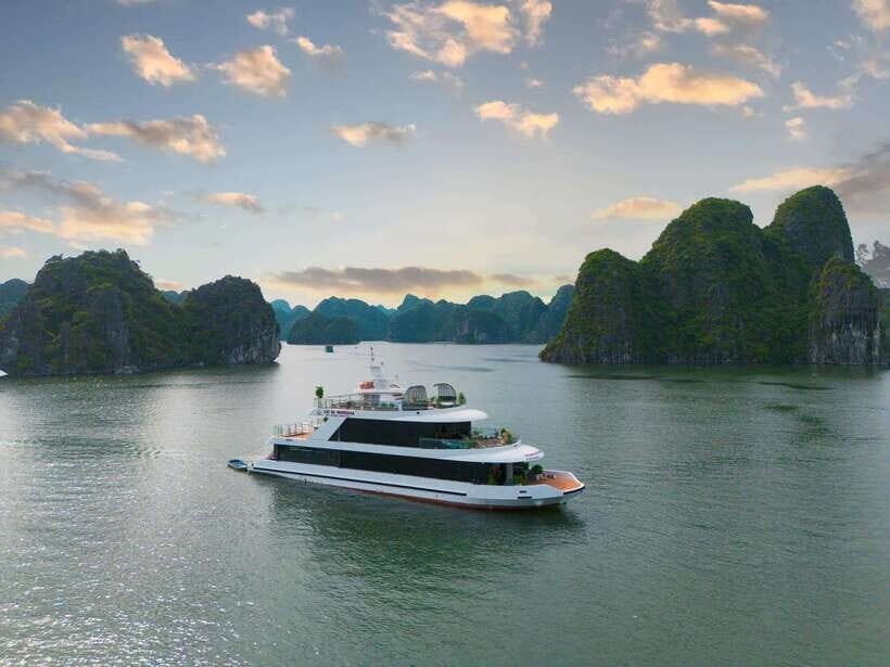 D'Charme Luxury Day Cruise Discover the Stunning Lan Ha Bay - Hotel pickup, transfers, and the pace of the morning