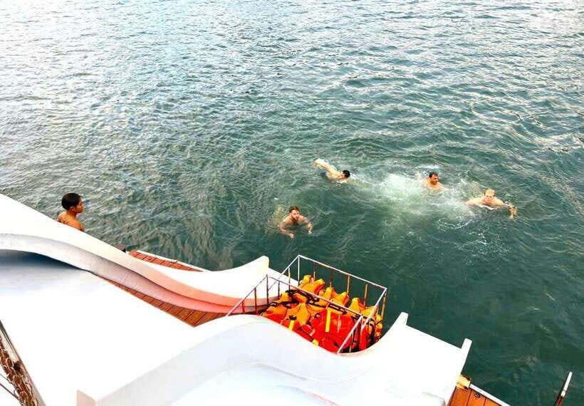 D'Charme Luxury Day Cruise Discover the Stunning Lan Ha Bay - Kayaking at 1:00 PM: calm lagoons and limestone walls