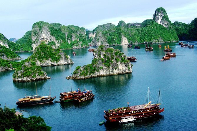 Deluxe Halong Bay 6 Hours Cruise To Visit Surprising Cave And Titop Island - Kayaking and bamboo boats: hands-on time on Halong water