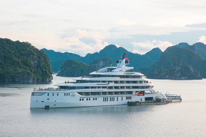 Discover Ha Long Bay in 2 Days and 1 Night Cruise Experience - Day 1 From Hanoi to the Bay: Islands, Caves, and Filming Spots