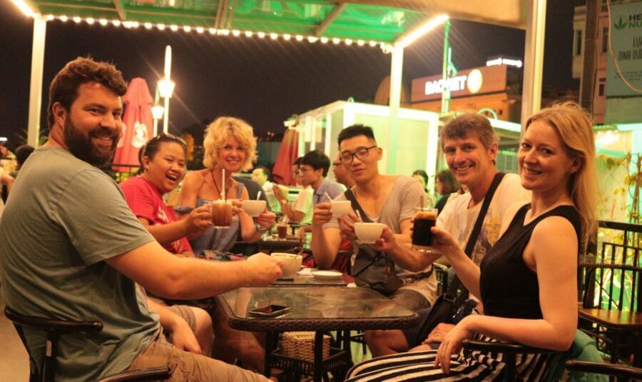 Discover Hanoi's Street Food by Night & Mini Class Coffee - Walking route stops: markets, heritage, and the Old Quarter gate