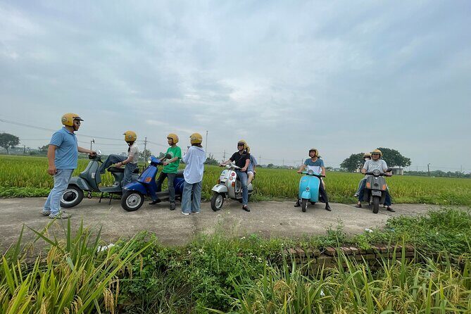 Exploring Vespa Tour Through Little Red River Delta - Meeting at Hanoi Opera House and getting on the Vespa calmly