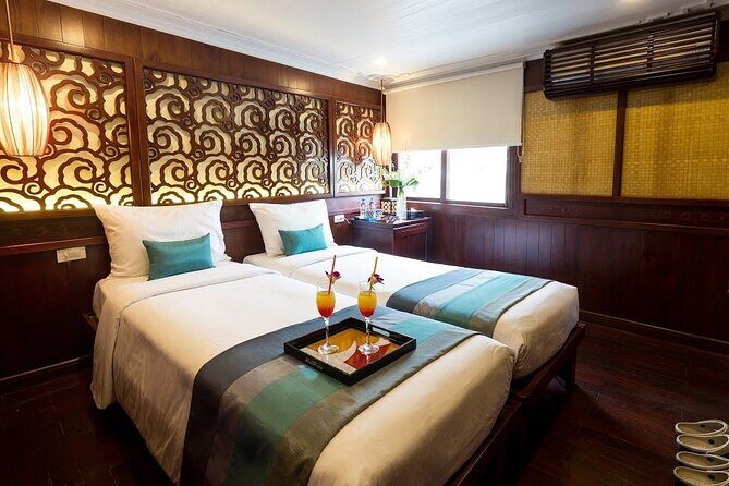 Featured: All-Inclusive OVERNIGHT Halong Cruises - many options - Day 2 morning on deck: Tai Chi, sunrise timing, and cave highlights