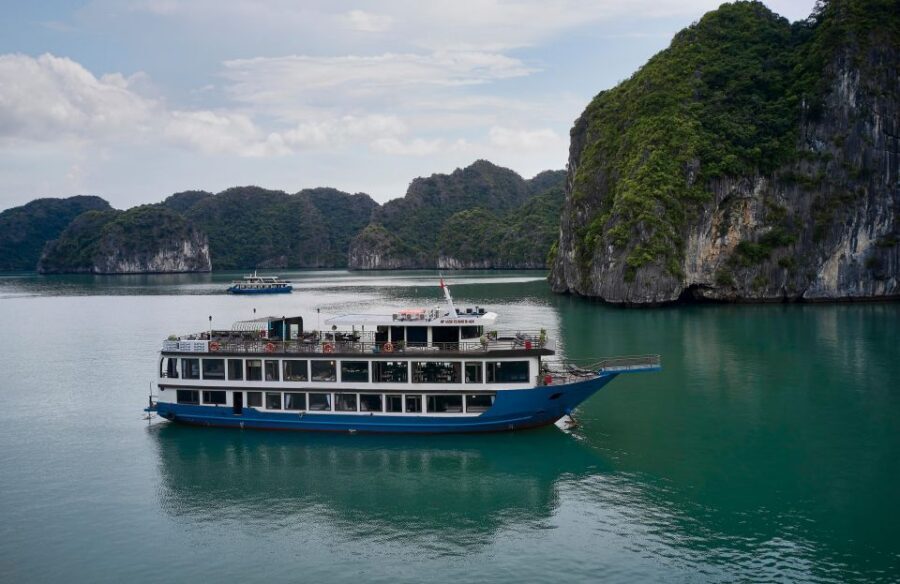From Halong: 2 Days / 1 night with Halong - Lan Ha tour - Night on the cruise: dinner, cabin comfort, and optional fun