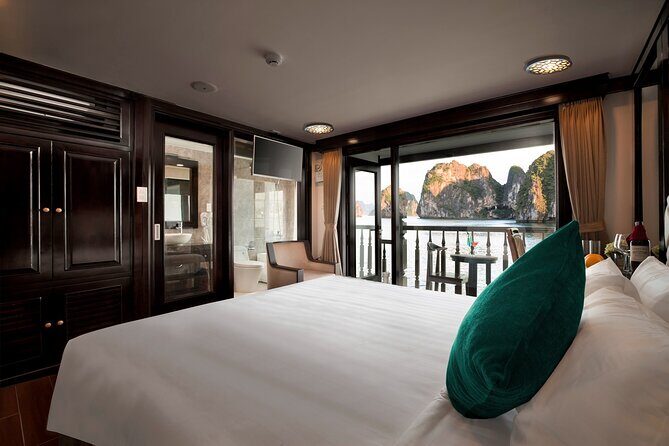 From Hanoi: 2-Day Luxury Halong Cruise Explore Caves & Island - Day 2: breakfast, check-out rhythm, and Titop Island swimming or hiking