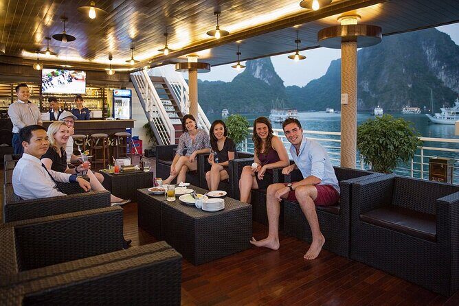 From Hanoi: 2-Day Luxury Halong Cruise Explore Caves & Island - Sunset party, stargazing deck time, jacuzzi, and night squid fishing