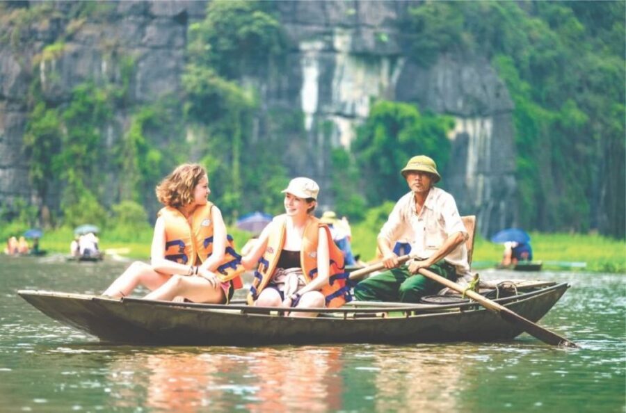 From Hanoi: 2-Day Ninh Binh & Ha Long Bay Sightseeing Tour - The Ha Long Bay sunset party: red wine, cake, fruits, and staying warm