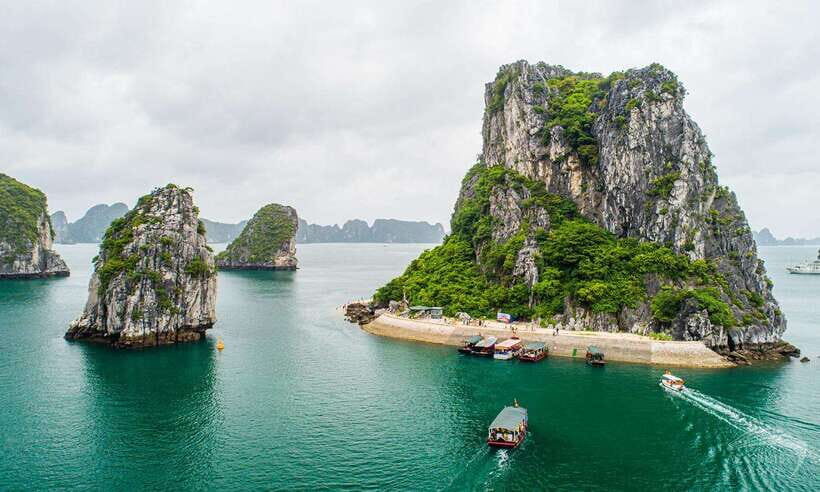 From Hanoi: Ha Long Bay 1 Day Tour With A Small Group - Titop Island viewpoint and swimming: the moment the bay looks like a postcard