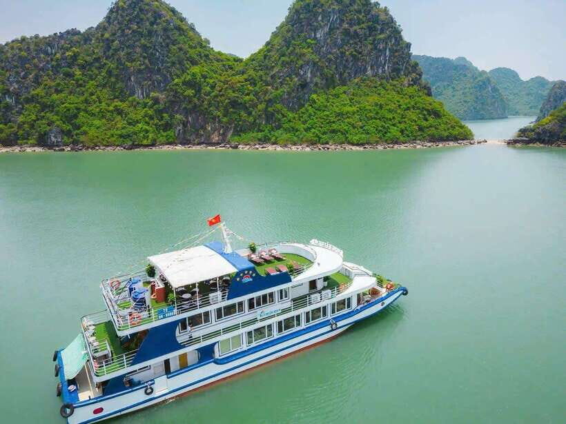 From Hanoi: Ha Long Bay Full-Day Luxury Cruise - Sunset party on the cruise: wine, tea, fruits, biscuits