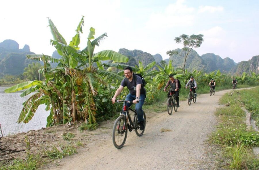 From Hanoi: Ninh Binh, Hoa Lu, Tam Coc and Mua cave - Stop 2: Tam Coc sampan ride for the limestone “three caves” views