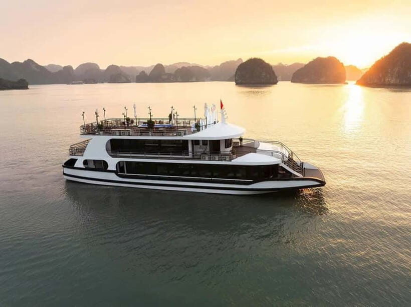 From Hanoi:Ha Long Bay Day Tour w/ Thien Cung Cave& Kayaking - Cruising Ha Long Bay on a traditional wooden boat (and why it matters)