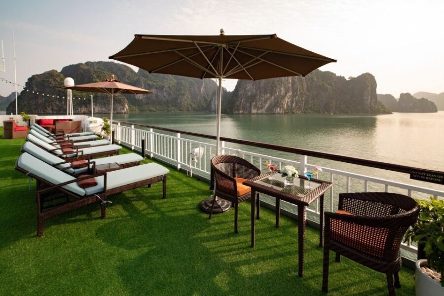From Ninh Binh: Ha Long - Lan Ha Bay 2D1N on 5-star Cruise - Day 2: morning Tai Chi, breakfast, and getting to Hang Sang & Toi