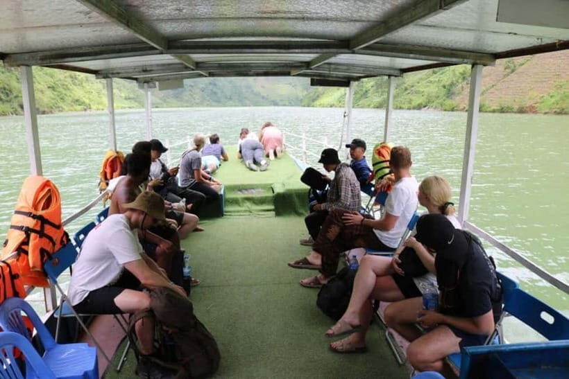 From Sapa: 4-Day 4-Night Ha Giang Loop Motorbike Tour - Day 4: Self-drive segment, waterfall swim, and Lung Tam textiles