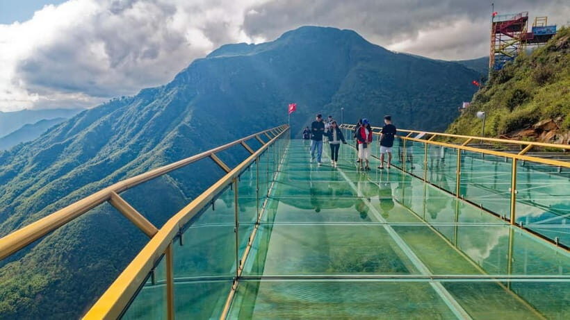From Sapa: Glass Bridge and Silver Waterfall Group Tour - Silver Waterfall Stop: Cooling Air and Real Scale