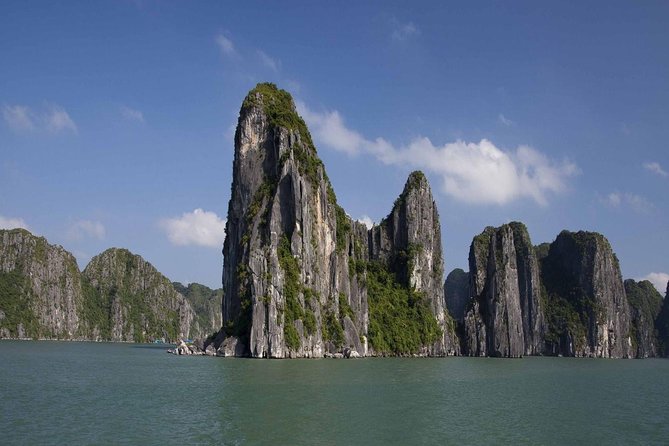 Full-Day Halong Bay Tour Including Kayaking from Hanoi - Boarding the traditional junk boat: what you get right away