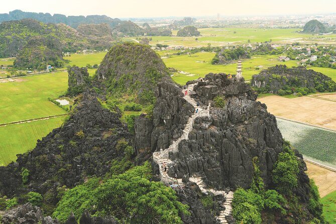 Guided Full Day Ninh Binh Small Group Tour by Limousine - Tam Coc Village: Tea, Peanut Candy, and VAC Farming Life