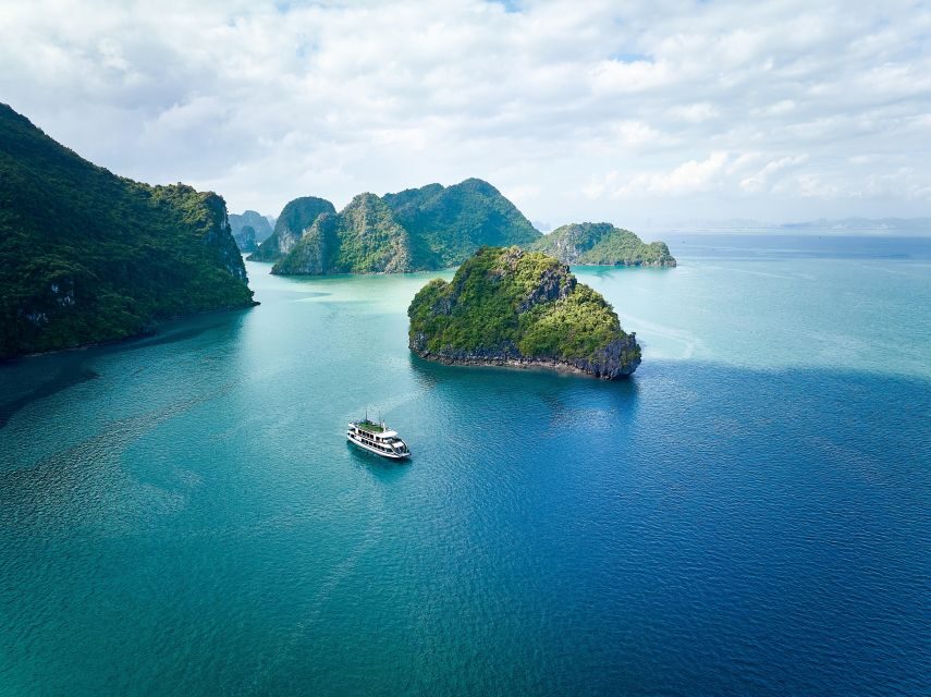 Ha Long & Bai Tu Long bay cruise wt Kayakking & buffet lunch - Sunset tea party on the return cruise: wine, fruit, and biscuits