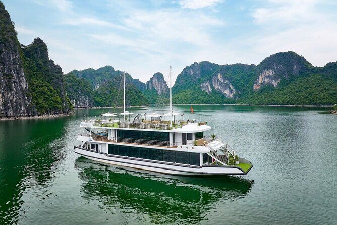 Ha Long Bay Luxury Day Cruise with Buffet Lunch, Caves & Kayaking - Sung Sot Cave: the big cave stop and its stair reality
