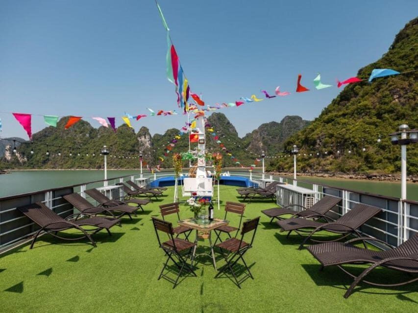 Ha Long: Half Day Cruise with Lunch, Kayaking, and Swimming - Back on the boat: sunset tea, cake, fruit, and a little wine