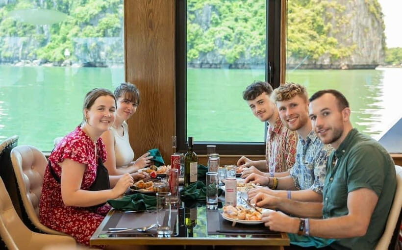 Halong 6 Hours Cruise: Kayak, Cave, Lunch, Beach & Island - The sunset party on deck: red wine, fries, fruits