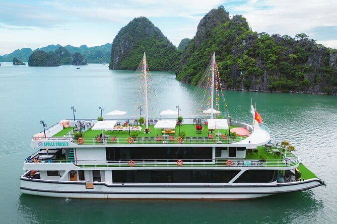 Halong Apollo 5<em> Cruise with Jacuzzi Day Trip And Buffet Lunch – Key highlights you’ll actually care about’ /></p>
<ul>
<li><strong>5-star boat experience without the overnight</strong>: a day-trip format that covers the main sights</li>
<li><strong>Cave and lagoon combo</strong>: kayaking/bamboo boat at Hang Luon plus a long stop at Sung Sot</li>
<li><strong>Ti Top Island choice</strong>: swim time or a climb for views (your call)</li>
<li><strong>Buffet lunch onboard</strong>: both Asian and European options, included</li>
<li><strong>Sunset party at Tuan Chau</strong>: cakes, wine, and fruit after the island time</li>
<li><strong>Smaller group size</strong>: up to <strong>19</strong> people on the max-cap departures</li>
</ul>
<h2 id="a-1-day-halong-bay-plan-that-feels-like-the-real-thing">A 1-Day Halong Bay Plan That Feels Like the Real Thing</h2>
<p><img width="669" height="446" decoding="async" src=