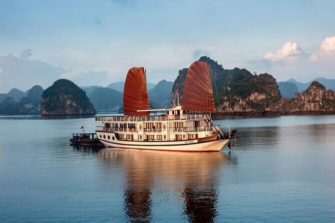Halong Bay 2 Day Cruise Including Transfer from Hanoi - Day 2: sunrise Tai Chi, Luon area boat time, caves, and Titop
