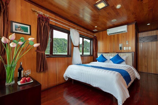 Halong bay boutique cruise 2 days trip: Kayaking, swimming & caving tours - Night onboard: seafood dinner plus fishing or karaoke