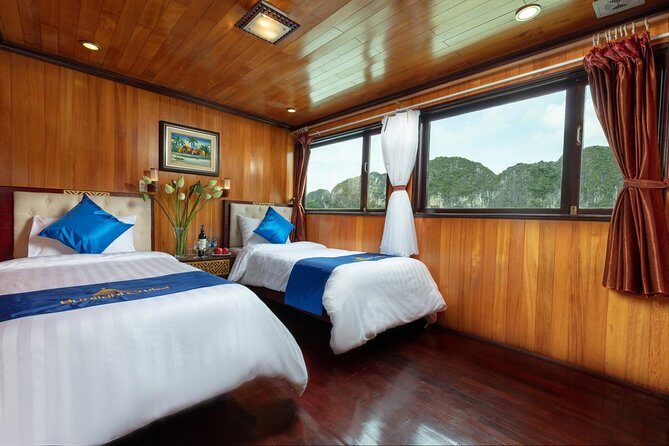 Halong bay Boutique Cruise 2D/1N tour: Kayaking, swimming, Titop island & cave - From Hanoi to the harbor: pickup, check-in, and your first onboard afternoon