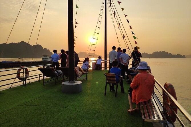 Halong Bay Day Tour With Titop Island, Cave, Kayak & Lunch - Luon Cave Area Kayaking or Bamboo Boat: A Hands-On Halong Bay Moment