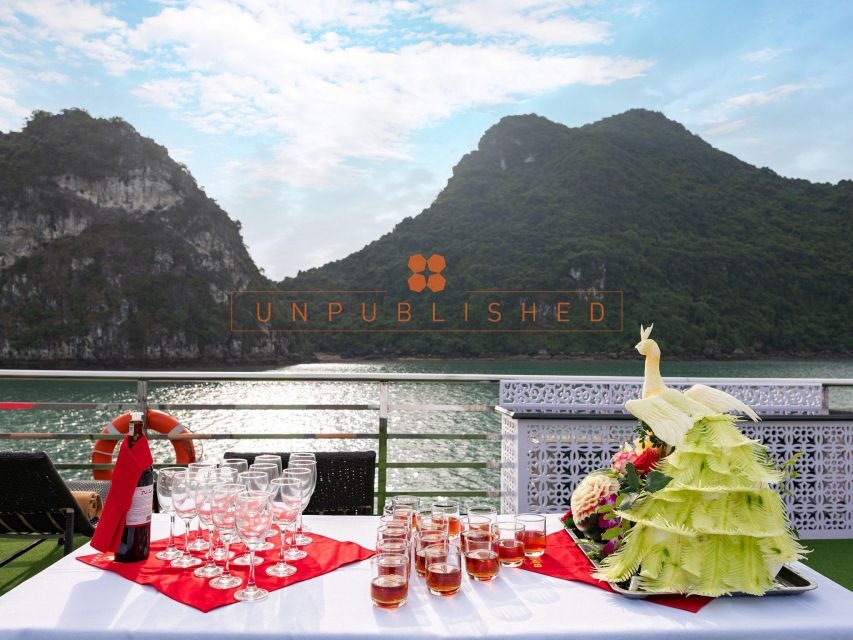 Halong Bay Delights: Deluxe Day Cruise with Kayaking & Lunch - Luxury Cruise Feel: Welcome Drink, Guide, and a Real Onboard Program