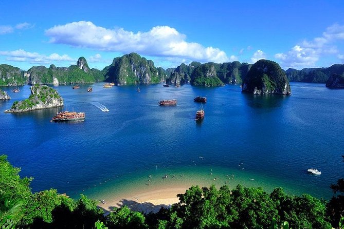 Halong Bay Full Day Tour with All-Inclusive: Boat, Kayak, Island, Cave and Lunch - Pickup at 7:45 and the drive to Tuan Chau Harbour