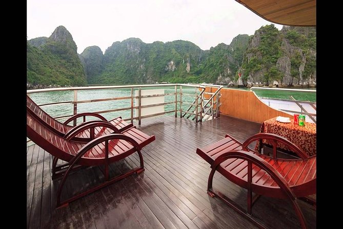 Halong Bay Full Day Tour with All-Inclusive: Boat, Kayak, Island, Cave and Lunch - Ti Top Island plus Surprising Cave: two styles of sightseeing